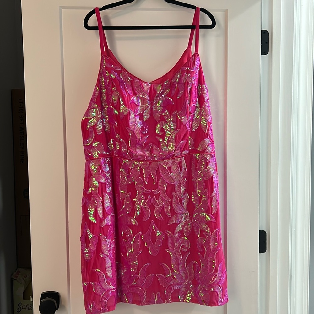 This is a size 20, pink, dress from Sydney’s Closet.